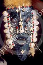Amazon indian mask in Manaus Brazil, adorned with fish bones and scales.