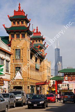 Historic On Leong building in Chinatown with Sears Tower in the background in Chicago, Illinois.
