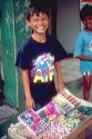 Native brazillian boy selling candy on the streets of Manaus Brazil.