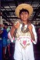 Brazillian indian boy holding pet python snake around his neck in Manaus Brazil.