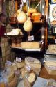 Many flavors and types of cheese on display at store in Turin, Italy.