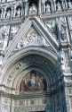 Painting and sculpture adorns the exterior of the Duomo in Florence, Italy.