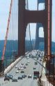 Automobiles traveling across the Golden Gate Bridge in San Francisco, California.