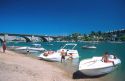 Pleasure boats gather at the London Bridge in Lake Havasu, Arizona.