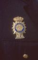 The badge of the National Police in Spain.