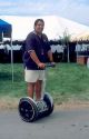 Man rides a segway at the Idaho State Fair.