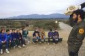 A park ranger in Ano Nuevo Point, California shows children an elephant seal skull.