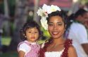 Hawaiian woman holding her daughter.