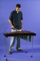 A man playing a xylophone.