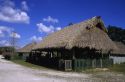 A seminole Miccosukee Indian village with chopekcheke traditional thatched roof dwellings in Florida.