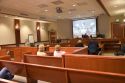 Video arraignment in criminal court in Boise, Idaho.  Defendants appear on video screen from secure jail facility while judge in courtroom conducts arraignment and sets bond.