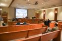 Video arraignment in criminal court in Boise, Idaho.  Defendants appear on video screen from secure jail facility while judge in courtroom conducts arraignment and sets bond.