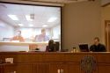 Video arraignment in criminal court in Boise, Idaho.  Defendants appear on video screen from secure jail facility while judge in courtroom conducts arraignment and sets bond.