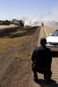 An automobile accident on Interstate 40 east of Moriarty, New Mexico with a state trooper investigating.