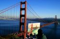 An artist paints a picture of the Golden Gate Bridge in San Francisco, California.