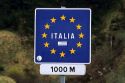 Italy border sign with the European Union Flag.