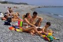 A beach scene with family along the Ligurian Coast in Italy.