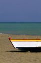 A fishing boat on the sandy beach in Southern Spain.