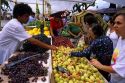 People shop at an outdoor market in Rio de Janeiro, Brazil.