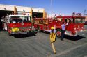 Firemen doing maintenance on fire trucks at a fire station in Caldwell, Idaho.