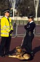 Police dog and officers in London, England.