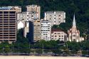 Church and modern buildings along the waterfront in Rio de Janeiro, Brazil.