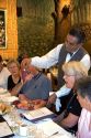 Waiter shows customers raw beef at Estancia a famous restaurant in Argentina.