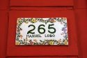 Painted tile with street address in Colonia, Uraguay.