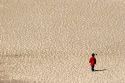 Child walking on sand dunes at Nags Head, North Carolina.