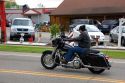Man riding a motorcycle through Berlin, Ohio.