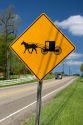 A road sign warning of horse and buggy crossing near Berlin, Ohio.