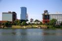 Old Statehouse and modern office buildings along the Arkansas River at Little Rock, Arkansas.