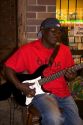 A musician playing an electric guitar on Beale Street in Memphis, Tennessee.