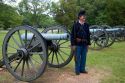 Civil war soldier reenactor and park ranger at Shiloh National Park battlefield, Tennessee.