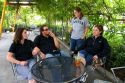 A group of people smoking outdoors at a coffee shop in Boise, Idaho.  MR.