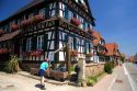 French man pumping water at the village of Betschdorf, France.