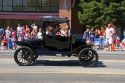 Antique automobile in a small town Fourth of July parade in Cascade, Idaho.