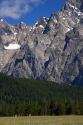 Horseback riding in Grand Teton National Park, Wyoming beneath Mt. Moran.