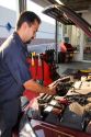 A mechanic giving an automobile an oil change in Boise, Idaho. MR