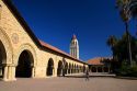 Arched portico of the Main Quadrangle at the campus at Stanford University in Palo Alto, California. Hoover tower in the background.