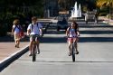 Students ride bicycles on the campus at Stanford University in Palo Alto, California.