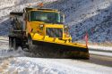 A snow plow removing snow from the road near Boise, Idaho.