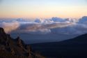 Sunrise above the clouds atop Mount Haleakala on the island of Maui, Hawaii.
