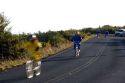 Tourists ride bicycles down Mount Haleakala on the island of Maui, Hawaii.