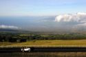 An automobile travels on the Mount Haleakala road on the island of Maui, Hawaii.