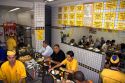 People eat at a lanchanette, cafe, restaurant in the Liberdade asian section of Sao Paulo, Brazil.