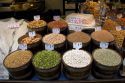 A variety of dried beans, lentils, and nuts being sold at the Mercado Municipal in Sao Paulo, Brazil.