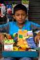 Brazilian boy selling items on the street in Manaus, Brazil.