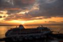 A cruise ship at sunset docked in Manaus, Brazil.