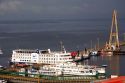 Cruise ships and Amazon river boats docked at Manaus, Brazil.